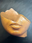 Fragment of a Queen's Face Rolled Canvas Print